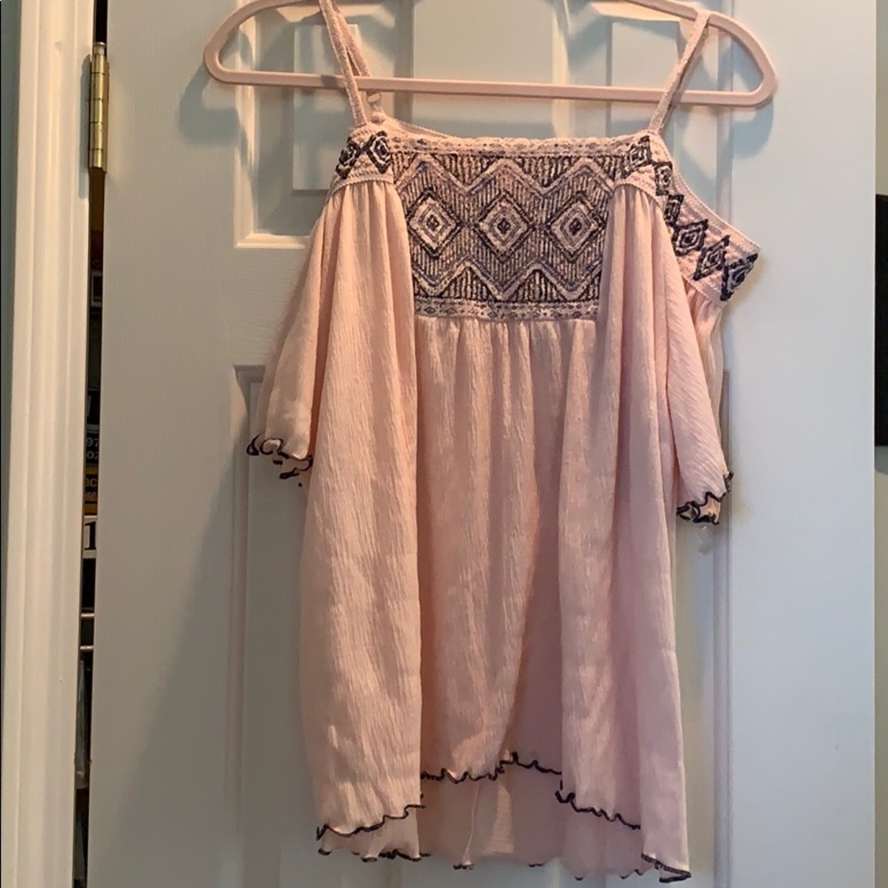 Off shoulder blouse.